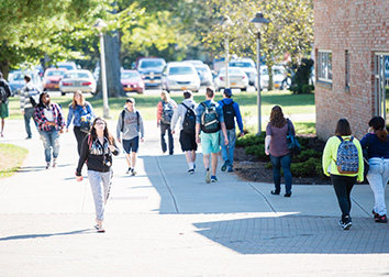 Students walking on a sidewalk at SUNY Jamestown Community College.