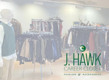 A look inside a college career closet with cloths hanging with an overlay graphic that reads J-Hawk Career closet with a JCC Jayhawk logo.