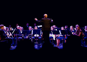 music conductor leading band