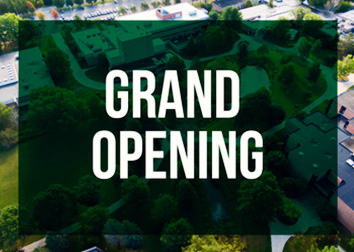 A drone image of the Jamestown Community College Campus with a green box and the words "Grand Opening."