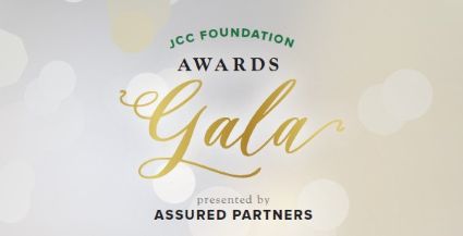 Elegant JCC Foundation Awards Gala invitation with gold script and a soft bokeh background. Text notes it's presented by Assured Partners.