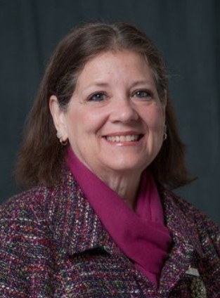 headshot of professor Lori Quigley