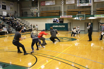 Members of the SUNY Jamestown Community College Jamestown Campus community play tug-of-war in the Phys. Ed. Complex.