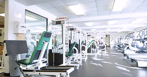 An image of weight machines in the Total Fitness Center at SUNY JCC