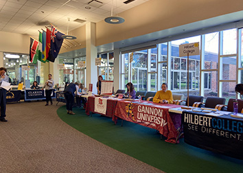 Tables staffed by college representatives in the Student Union at SUNY Jamestown Community College.