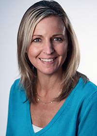 A headshot of Sarah Tranum, professor and director of Occupational Therapy at SUNY Jamestown Community College.