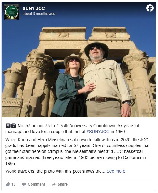 A facebook post showing a couple in sun hats stands in front of an ancient, ornate stone structure with tall columns. They seem relaxed and content in the sunlight.