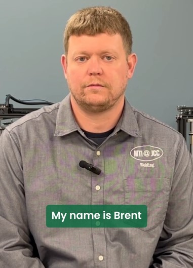 Screenshot of a video of a person talking with the words My name is Brent. 