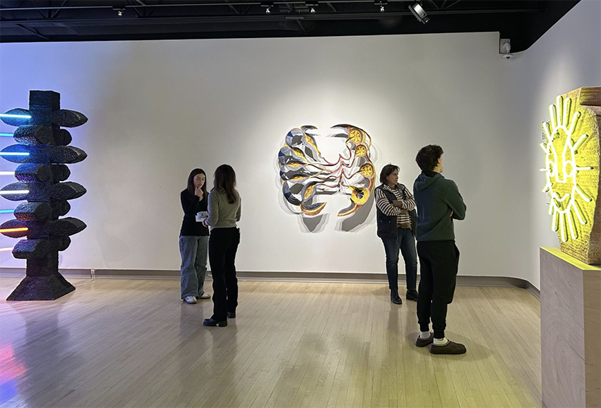 people viewing artwork in the gallery
