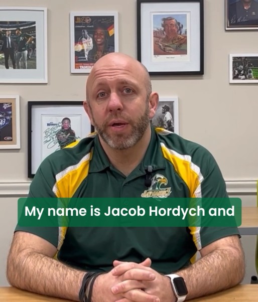 Screenshot of a video of a person talking with the words My name is Jacob Hordych.