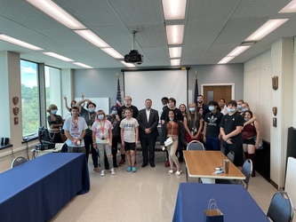 Jamestown Mayor Eddie Sundquist stands with students participating in LPP's Career Exploration Workshop.