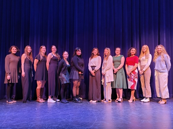 High School students standing together during the College Connections student speech contest.