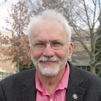 A headshot of Dr. Gregory Rabb, newly-retired SUNY JCC Professor