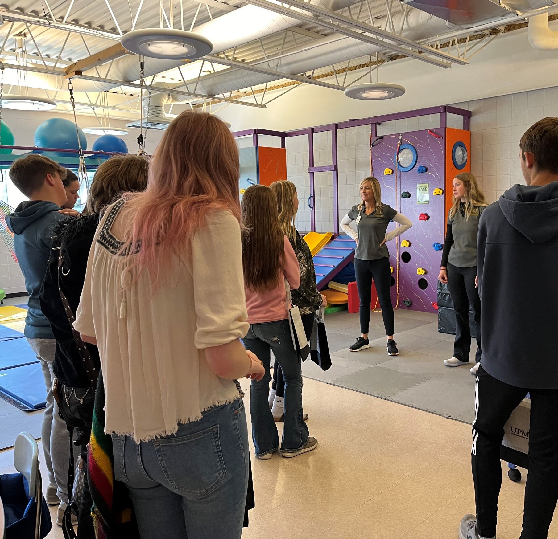 High school students touring JCC's Explore and Soar Occupational Therapy Clinic.