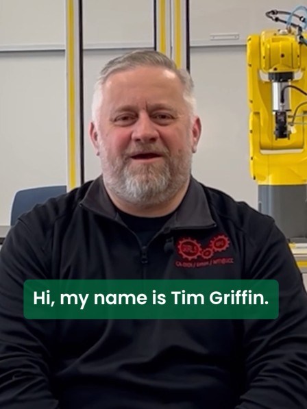 Screenshot of a video of a person talking with the words Hi, my name is Tim Griffin.